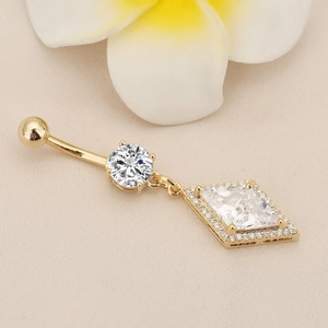 Detailed view of a gold navel ring featuring a diamond rhombic pendant and plumeria flower