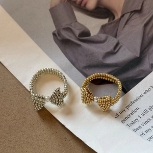 Handmade beaded bow ring with pearl detail in gold and silver finish for women