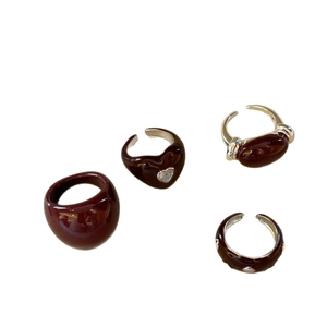 Burgundy enamel heart ring set with copper zircon in dark red fashion jewelry ensemble