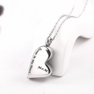 Detailed view of heart urn necklace engraved with Forever In My Heart for Mom