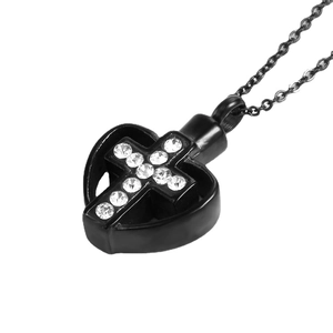 Schwarze Herz-Kreuz-Halskette mit weißen Kristallen auf hochwertigem Edelstahlgehäuse
