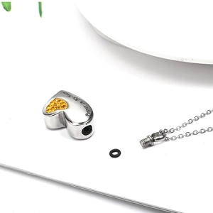 Polished heart cremation pendant with yellow crystals and Forever In My Heart engraving