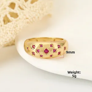 Chic 18K gold plated wide ring with star engraved red rubies, 9mm height and 5g weight