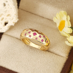 Retro gold wide band ring with star-set ruby red zircon and polished metallic finish