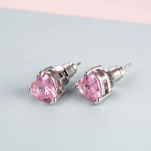 Pink heart-shaped zircon stud earrings with silver metal setting for women