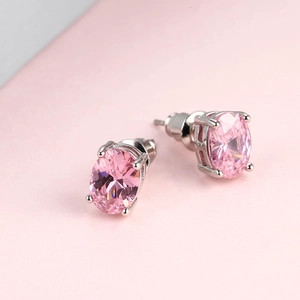 Oval pink opal stud earrings with four-claw silver setting for women fashion