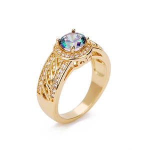 Luxury gold ring with colorful rainbow zircon and pavé diamond halo on white background