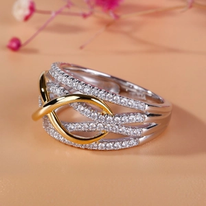 Elegant gold and silver two-tone layered ring with sparkling pavé-set round zircon stones