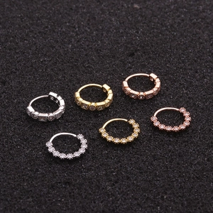 Lot de boucles d oreilles créoles en argent s925 or et or rose avec zircons sur fond noir