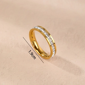 Elegant gold eternity ring with white cubic zirconia stones featuring 1.9cm inner diameter