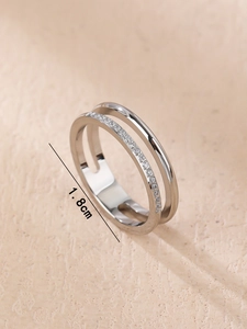 Macro shot of double-layer stainless steel ring with micro-inlaid stones and 1.8cm diameter