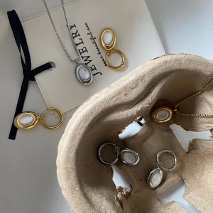 Minimalist 18K gold and silver plated necklaces and earrings with white oval gemstones