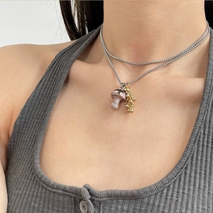 Double-layer titanium steel necklace with a purple stone mushroom and gold bead pendant