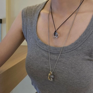 Layered titanium steel necklace with rainbow mushroom crystal and skull charms
