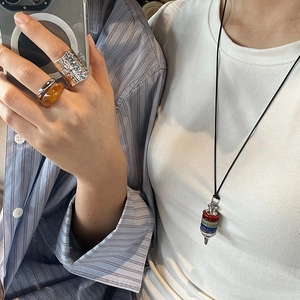 Rainbow crystal pendulum necklace with metal hammered rings and amber resin ring set
