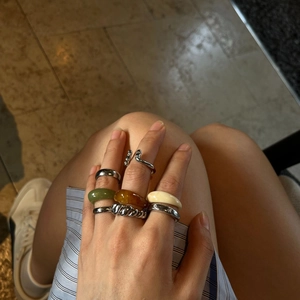 Retro resin and silver metal stackable open rings set in amber, green, and cream white