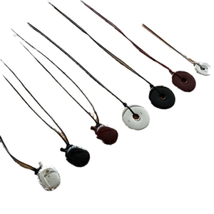 Polished agate bottle pendants on long leather cords in multiple earthy colors