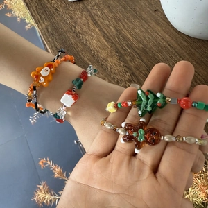 Handmade Christmas beaded bracelets with gingerbread man and holiday charms for women