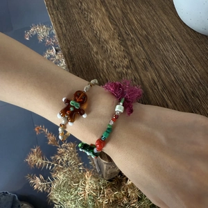 Christmas gingerbread man glass beaded bracelets with festive charms and colorful stones