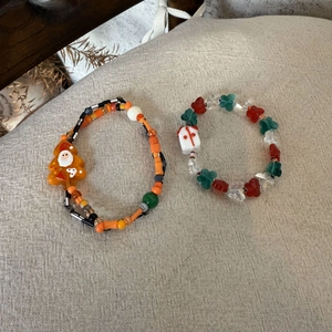 Detail view of handmade Christmas gingerbread man bracelets with festive glass beads