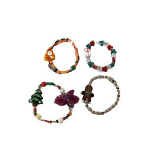 Christmas beaded bracelet set with gingerbread man charms and colorful glass stones