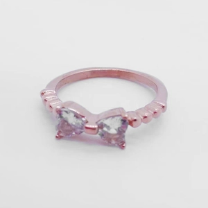 Bague nœud en or rose avec zircons roses de style coréen minimaliste pour femme
