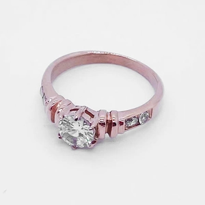 Elegant rose gold ring with a brilliant round center stone and six-prong setting