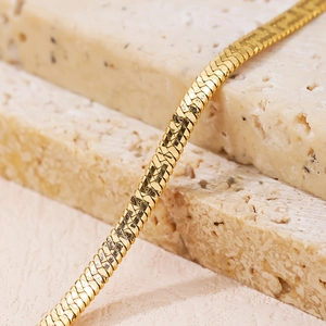 Elegant gold herringbone snake chain necklace for women with flat metallic texture