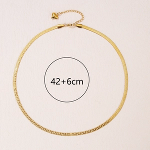 Golden snake chain necklace with Greek meander patterns and a small heart pendant