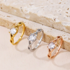 Classic round diamond-cut stone rings with rope bands in gold, silver, and rose gold finish