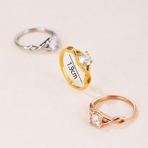Minimalist twisted band rings with round zircon inlay in silver, gold, and rose gold