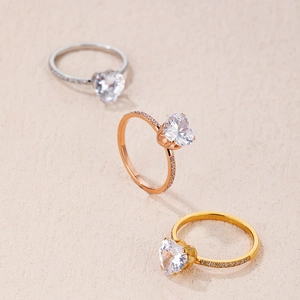 Elegant heart-shaped zircon rings in silver, rose gold, and gold plating with diamond accents