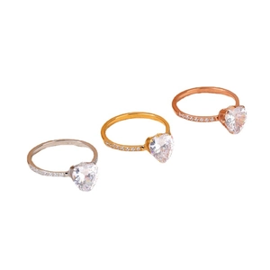 Elegant heart shaped zircon rings in silver gold and rose gold with pavé diamonds