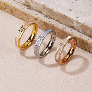 Three-piece stainless steel ring set with mother of pearl shell inlay and sparkling crystals