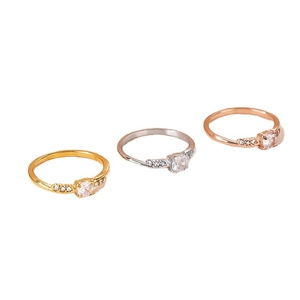 Three-piece minimalist slim ring set in gold, silver, and rose gold with tiny crystals
