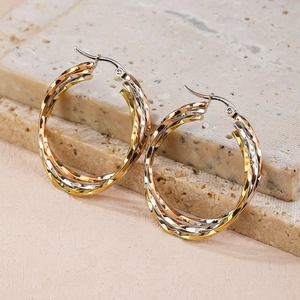 Three-tone twisted hoop earrings in gold silver and rose gold stainless steel