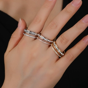 Three sets of stacked double-layer eternity rings in silver, rose gold, and gold plating