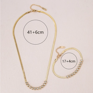 Elegant gold-plated stainless steel jewelry set with flat snake chain and round crystals