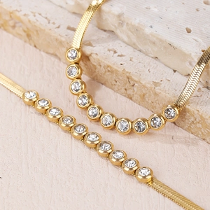 Elegant gold-tone flat snake chain necklace with sparkling zircon stone insets for women
