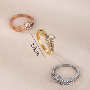 Crossed infinity ring set with pavé cubic zirconia in rose gold, gold and silver