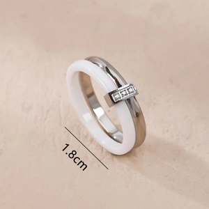 Minimalist white ceramic and stainless steel double band ring with zircon accents