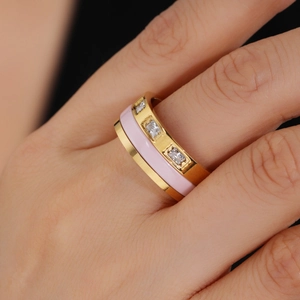 Modern gold and pink ceramic wide ring with three rectangular cubic zirconia stones