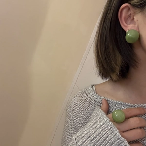 Translucent green resin jewelry set featuring minimalist round dome earrings and ring