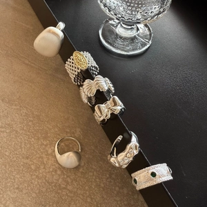 Italian brushed silver rings set with shell butterfly and emerald stone details