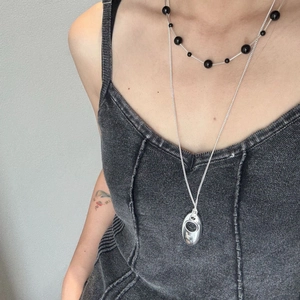 Silver teardrop pendant sweater necklace with layered black beaded choker for women