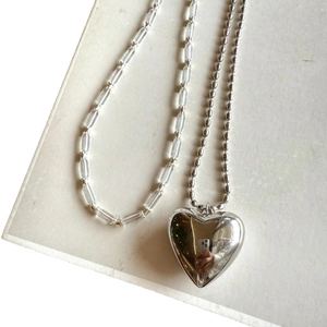 Silver long chain necklace with large heart pendant and faceted crystal beaded strand
