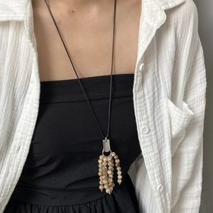 Natural stone beaded tassel necklace with minimalist silver pendant for women