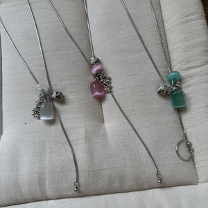 Three long Y-shaped titanium steel snake chains with natural stones and metal bead clusters