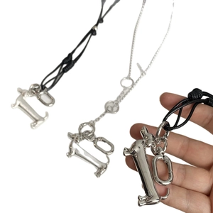 Minimalist silver dachshund puppy pendant with elegant long chain and black cord options