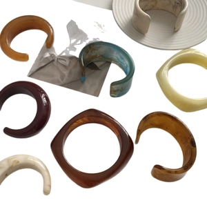 Colorful marble resin cuff bracelets in crescent shape for stylish women's fashion